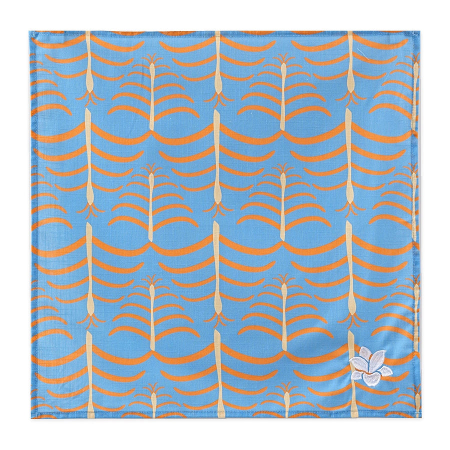 COCOLILI Cobalt Makuti cotton napkin with fine stems and arching lines, 45 × 45 cm.