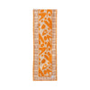 Orange Maumbo Tribal cotton canvas table runner by COCOLILI, 33 × 200 cm, photographed hanging on white.