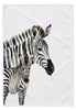 Duo Zebra cotton tea towel, 45 × 65 cm, with woven texture and stitched hems on a white studio background